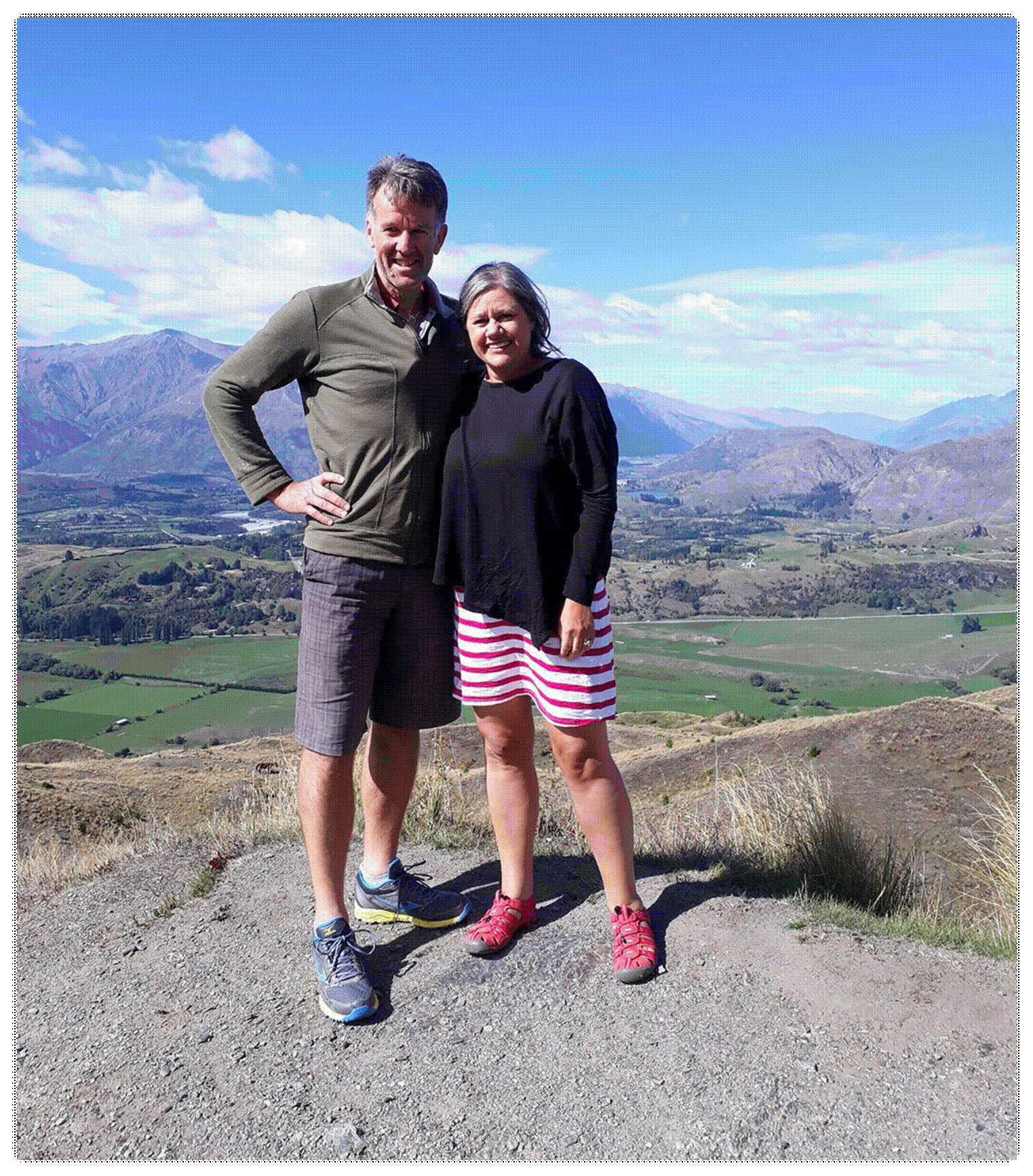 Image may contain: Kerry James Goodhew and Liz Goodhew, people smiling, people standing, mountain, sky, outdoor and nature